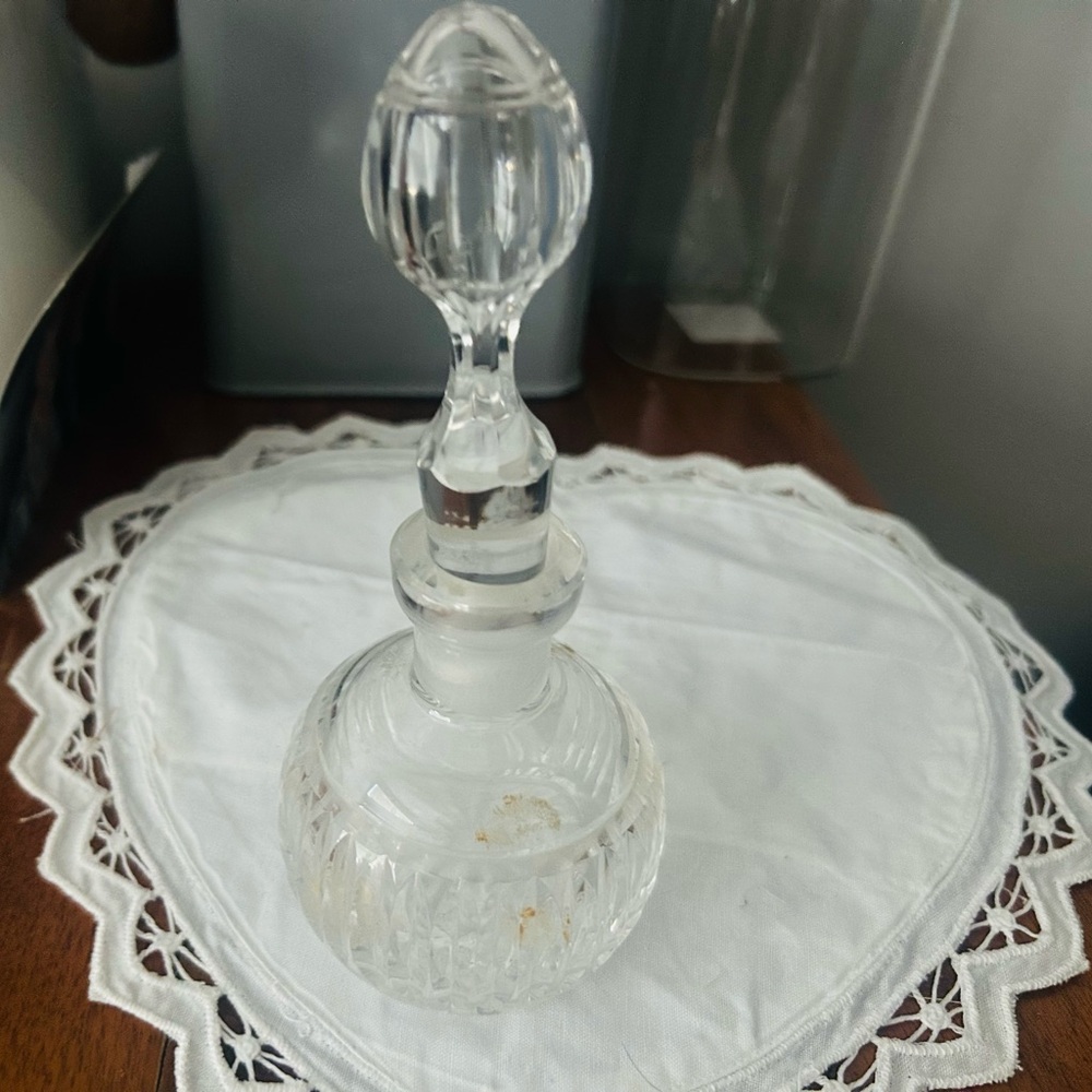 Elegant crystal bottle with stopper.